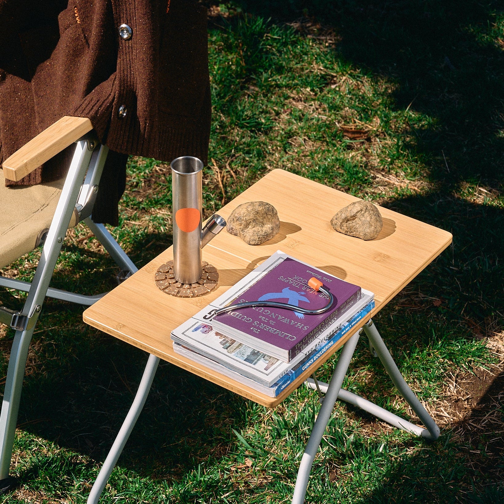 Lightweight titanium bong on wooden table